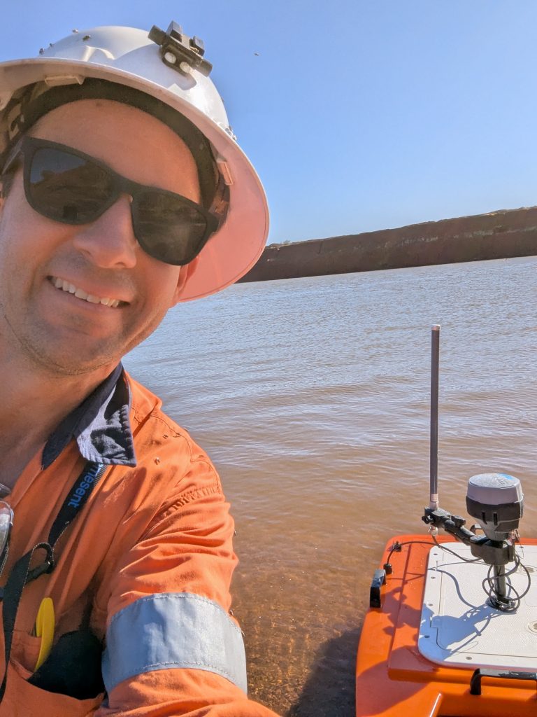 Peter in a boat with bathycat